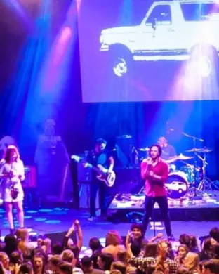White Ford Bronco Pop concert